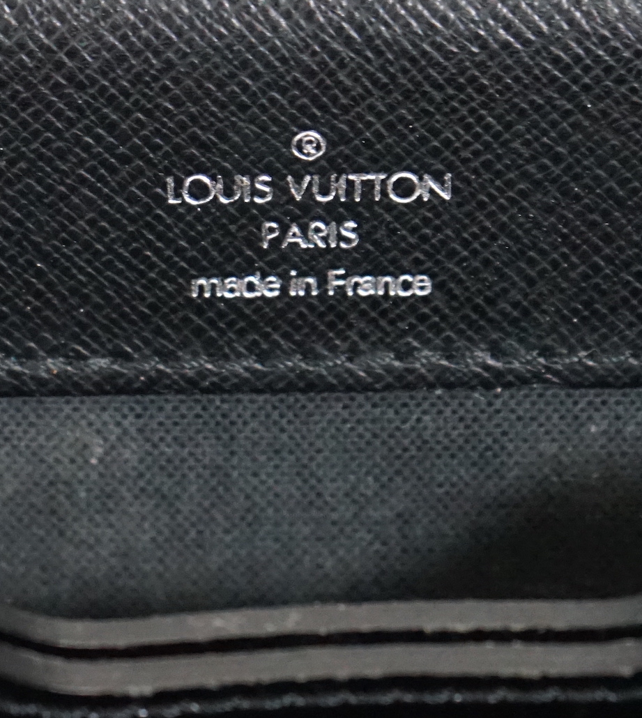 A Louis Vuitton Robusto briefcase in black taiga leather, width 41.5cm, height 33cm, depth 8cm